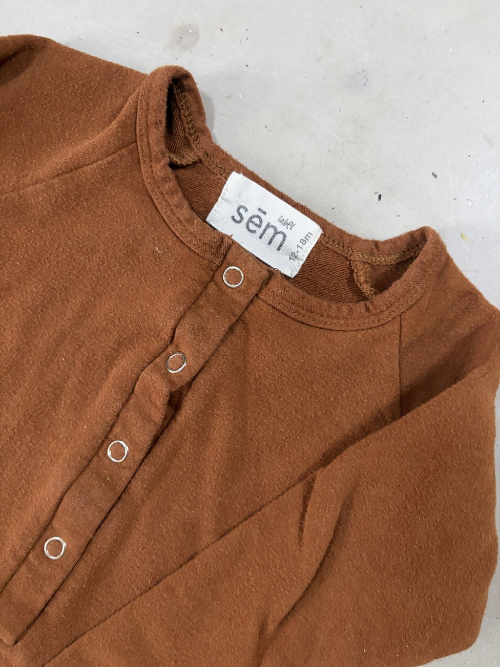 SEM label one piece || 12-18M